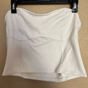 Cream Tube top with schmuck back.
